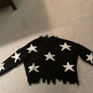 black sweater with white stars